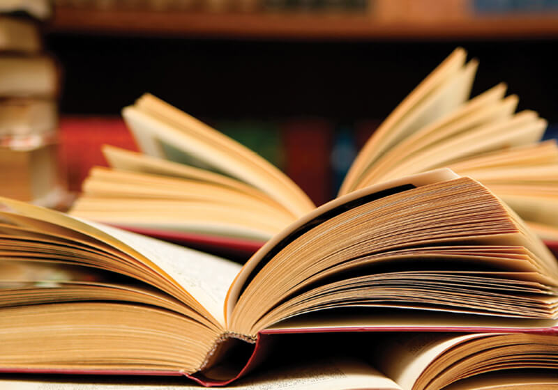 Open books on table