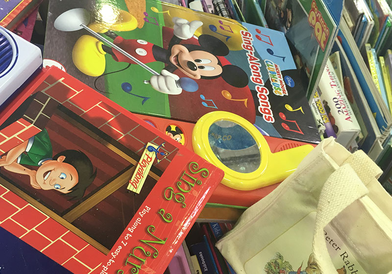 children's books scattered across a table