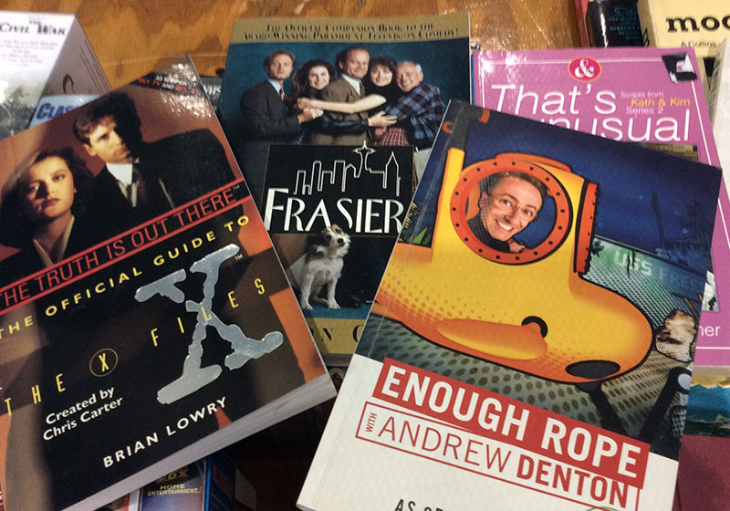 various books displayed on a table