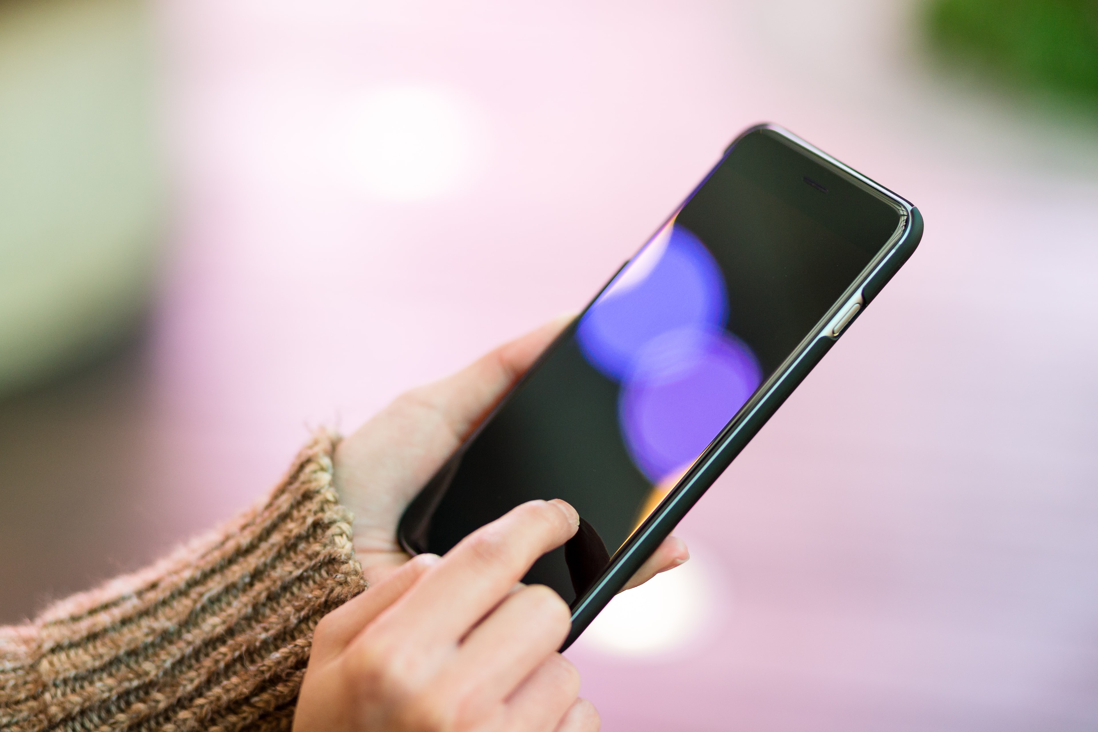 close-up-of-hand-using-a-modern-cellphone-2026-03-24-23-48-31-utc