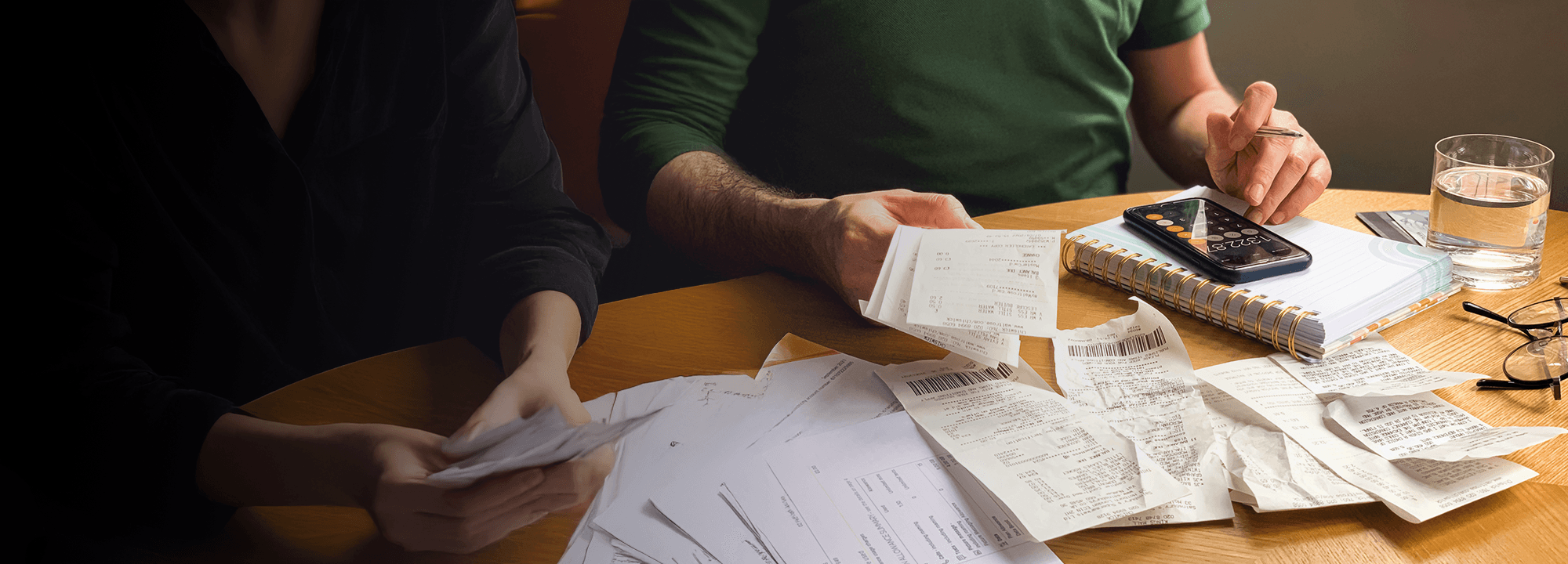 Man and woman looking over their finances