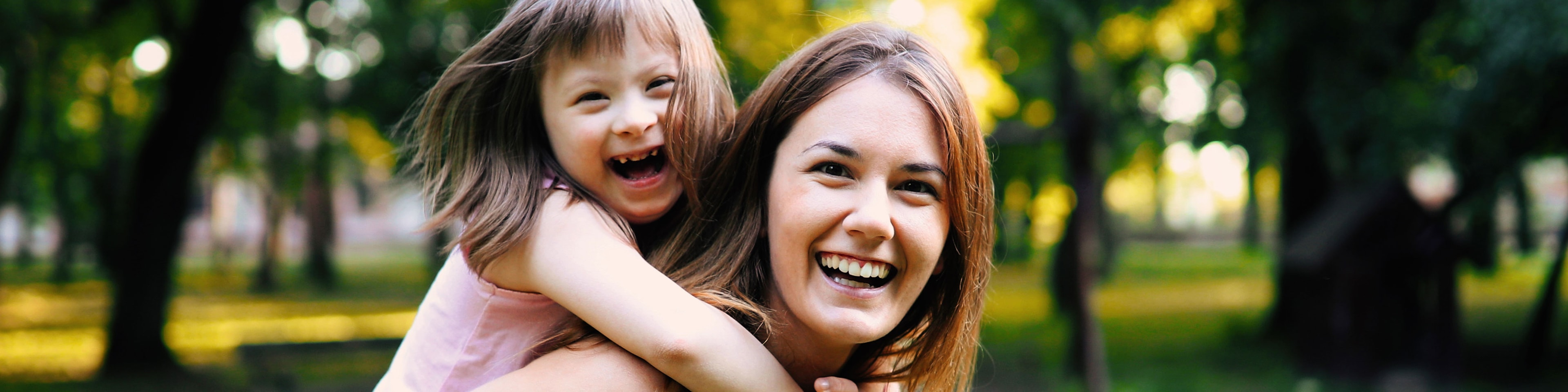 happy mother and child with disability