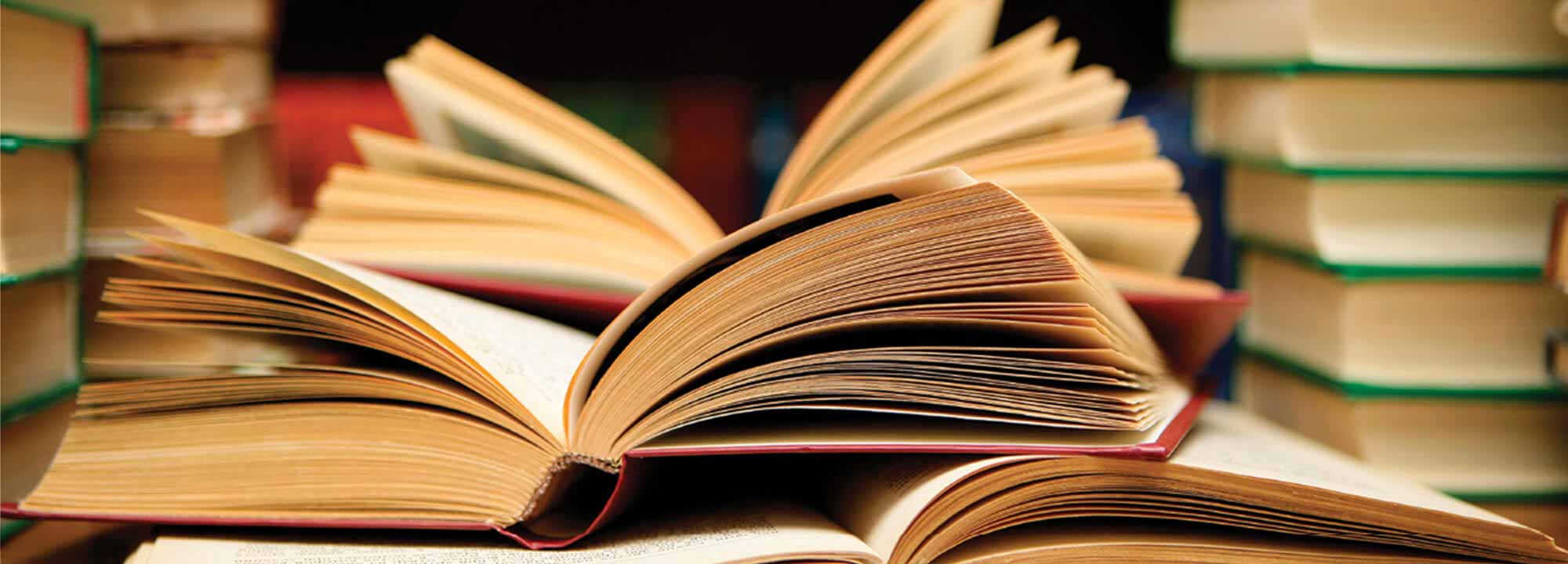 Open books on table
