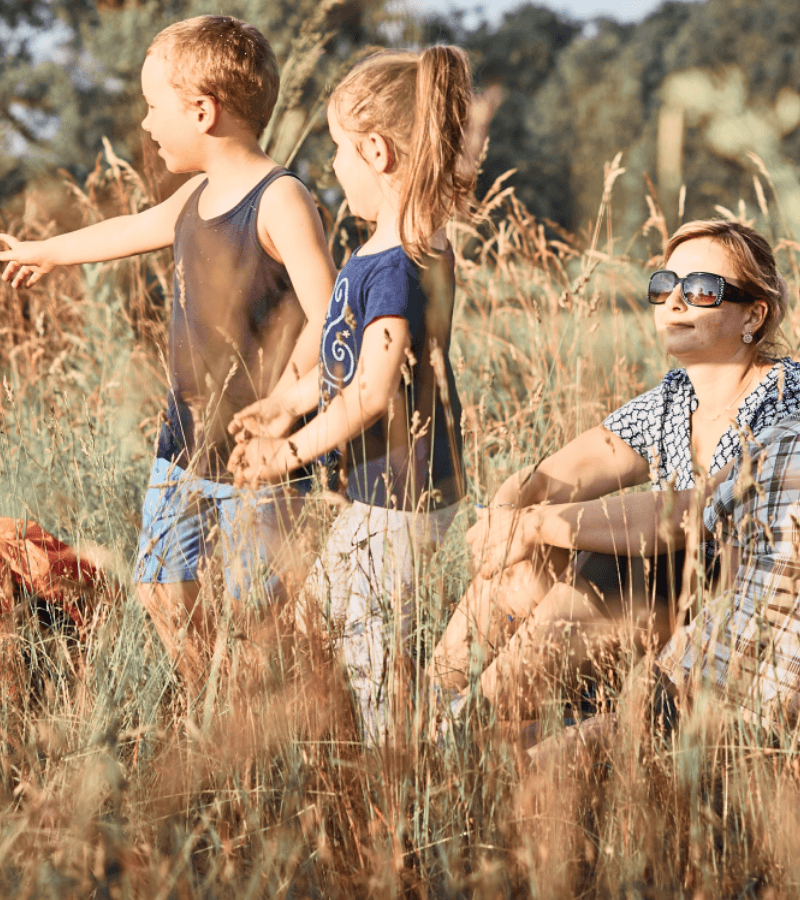 Family playing in the outback