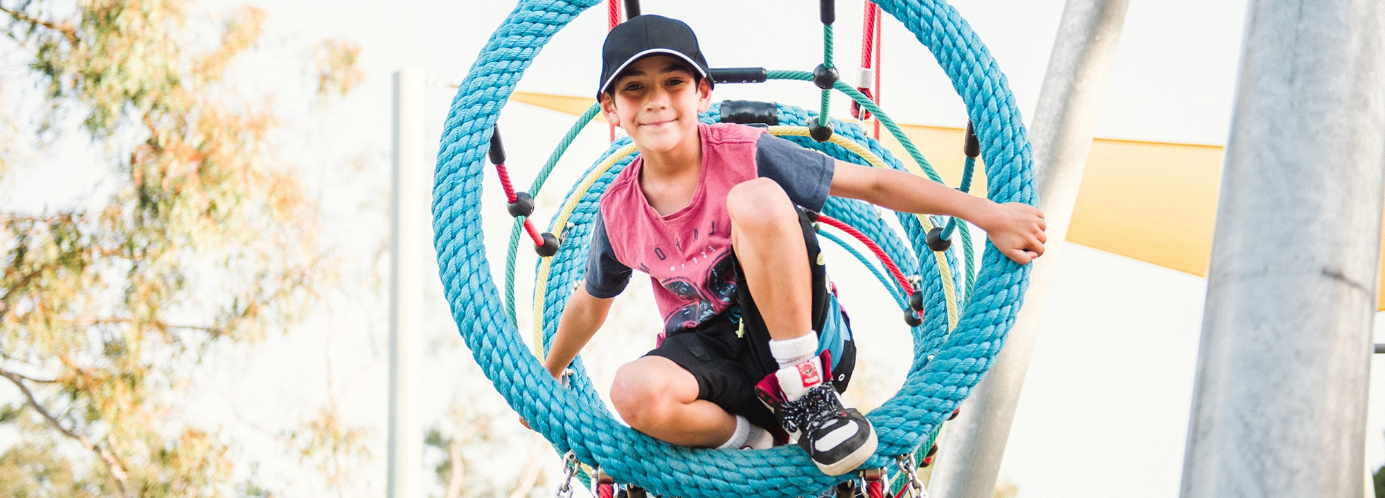 a young girl in an outdoor playground