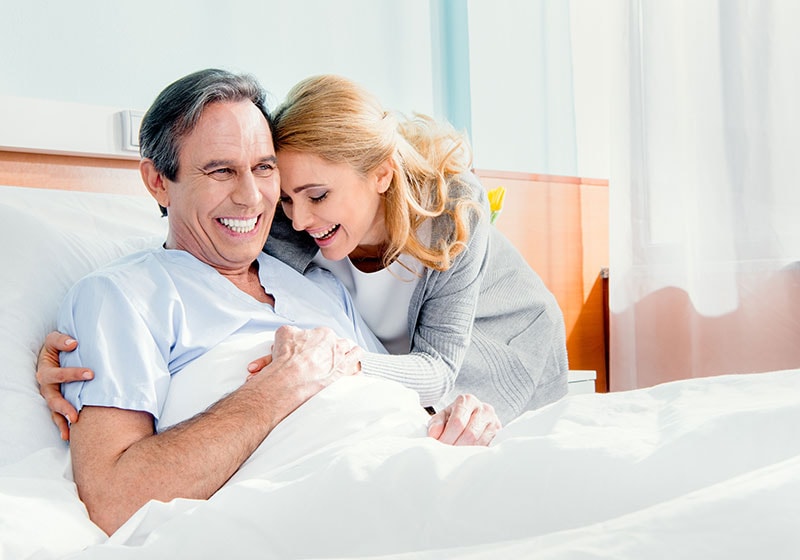 relived ginger wife hugs healthy husband after surgery