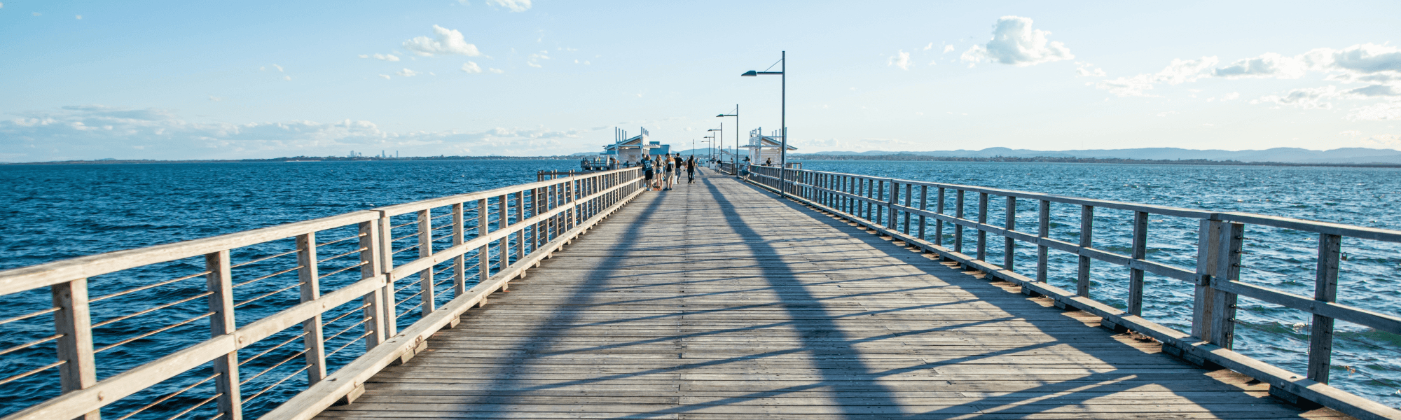 The Redcliffe Jetty stretches away over the bay.