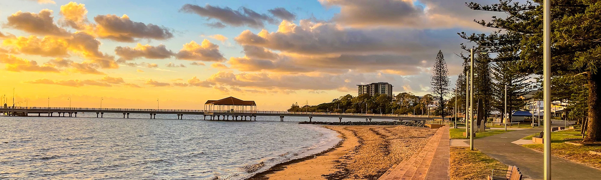 Dawn over the beach at Redcliffe.